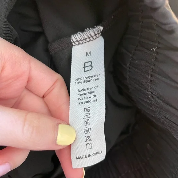 Black Trendy Athletic Dolphin Shorts - Picture 2 of 5